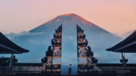 Traveler Standing at the Gates of Pura Lempuyang Temple aka Gates of Heaven Bali, Indonesia